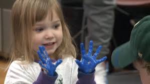 Cute video alert! Kids help paint mural for Bucks arena