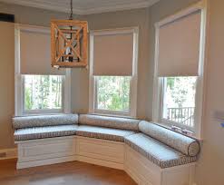 Any bench seat memories you'd care to share? Motorized Blackout Roller Shades And Window Seat Cushions With Bolster Pillows In This Kitche Bay Window Seating Kitchen Window Seat Kitchen Bay Window Benches