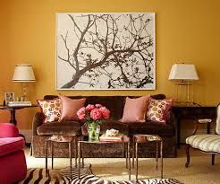 Chocolate Brown Sofa And Wall Art Create Warmth In The Living Room Living Room Colors Paint Colors For Living Room Living Room Paint