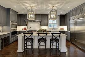 You'll find that gray looks great in larger kitchens and when it's used as part of your kitchen island. 20 Fabulous Kitchens Featuring Grey Kitchen Cabinets The Happy Housie