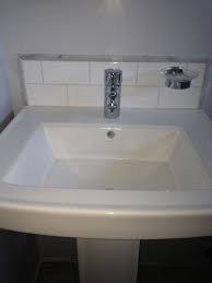 Pedestal Sink With Custom Back Splash Subway Tile With Marble Trim Grohe Faucet And Soap Dish Pedestal Sink Sink Tile Backsplash Bathroom