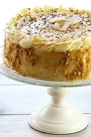 Based On Banoffee Pie This Caramel Banana Cake With Whipped Cream Frosting Recipe Has A Cookie Crumb Coating Finishe Caramel Banana Cake Banana Cake Recipes