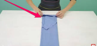 No Wrinkle Secret To Folding And Packing T Shirts Shirt Folding Shirt Wrinkles T Shirt Folding