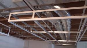 However, it's possible to affordably convert your basement into this type of environment if you're a diyer, as labor costs are the biggest obstacle. Build Basic Suspended Ceiling Drops Drop Ceilings Installation How To Drop Ceiling Basement Dropped Ceiling Install Drop Ceiling