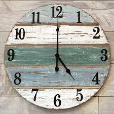 Enjoy free shipping on most stuff, even big stuff. Amazon Com 18 Inch Beach Clock Handmade Cedar Wood Beach Wall Clock Great Ocean Clock On Lake Time Clock Coastal Wall Clock Beach Theme Clock Tropical Clock Beach Wall Clocks Or