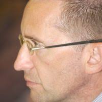 A cartoon giraffe with headphones and a tongue. Giraffe yellow animal.