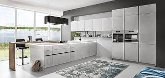 All the internal linen are dark grey which gives to the pool an amazing look but also makes it a lovely water temperature throughout the whole day. The Handleless Kitchen Line N From The Top Kitchen Manufacturer Nobilia Kuchen