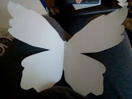 Diy Giant Lap Size Paper Butterflies I Made A Template For One Side Of The Butterfly An Butterfly Decorations Diy Giant Butterfly Decorations Giant Butterfly
