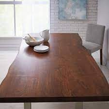 Clamp boards together with woodworking clamps or place weights on top of the boards to keep the boards pressed together and allow the wood glue to. Live Edge Wood Dining Table