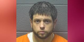 Man arrested in Strasburg after alleged domestic dispute involving a gun