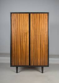 It is taller than other types of wardrobes, hence the name, and it is also often narrower than other types of wardrobes. G Plan E Gomme Golden Oak Tallboy Wardrobe By Tomahawkfurniture On Etsy Golden Oak Furniture Oak