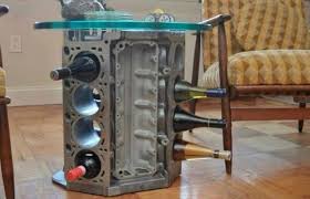 25 Inventive Examples Of Furniture Made From Car Parts Winerack Car Part Furniture Car Parts Decor Car Furniture
