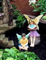 See more ideas about fairy houses, tree stump, fairy house. Buy Pretmanns Fairy Garden House Kit Fairy Tree House With Accessories 2 Girl Fairies And A Boy Fairy Door Can Open Wide Fairy Garden Supplies 4 Pieces Online In Indonesia B07shrds7l