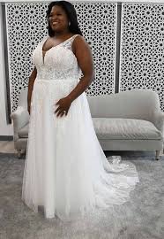 The halter neck part of the dress can go either forward or backwards. Category Plus Size Kleinfeld Bridal