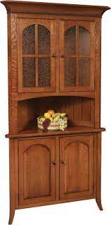 This corner cabinet is sturdy and durable with ample storage space. Solid Wood Bunker Hill Corner Hutch From Dutchcrafters Amish Furniture