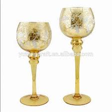 I used some spray paint to create silver and gold mercury glass candle holders. Gold Mercury Glass Gold Mercury Glass Goblet Holiday Candle Holder Set From Collections For Wedding Buy Mercury Glass Tealight Candle Holders Mercury Glass Stem Vases Tall Martini Glass Candle Holder Product On