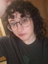 Can someone edit this photo to make the subject look glamorous and  beautiful?