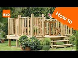 how to build a raised deck youtube deck designs backyard raised deck deck projects