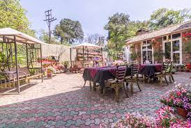 Pizza & music by the pond. Oyo 4631 Blueberry Inn Premium Shillong Book 2413 Oyo