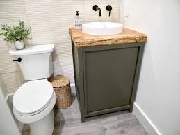 It was constructed using walnut and walnut veneer. 24in Bathroom Vanity Base Rogue Engineer
