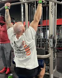 Here’s a little back and bicep work for ya. , 1. 4 sets of pull downs 8-12  rep range. Working