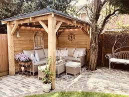 Fantastic Images Homemade Garden Seating Popular Outdoor Spaces And Patios Beckon Particularly If The Weath In 2021 Small Garden Gazebo Backyard Gazebo Backyard Patio