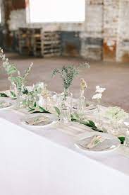 This Wedding At The Glass Factory Proves That Minimalism Can Be Totally Romantic Junebug Weddings Minimalist Wedding Reception Minimal Wedding Decor Minimalist Wedding Decor