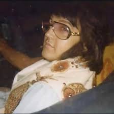 I have massive sideburns and out of control curls because it's 1974