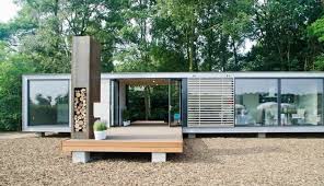 Panorama Fertigbungalow Decking Cortenstahl Aussenkamin Aussenkamin Haus Architektur Cube Haus