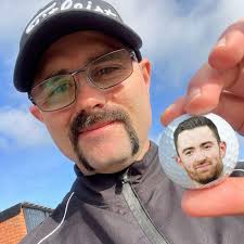 Father and son bonding over darts