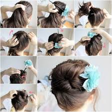 Comb hair out and twist either large or small sections into a ponytail. How To Diy Easy Bun Hairstyle Using Chopstick