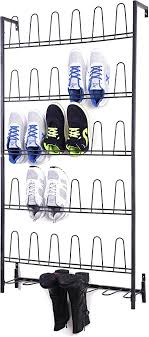 With this design, it saves up enough space so that you can have the chance to add more shoes to your shoe stand. Amazon Com Mygift Black Metal Wall Mounted Boots And Shoe Rack 18 Pair Entryway Shoe Storage Organizer Stand Home Kitchen