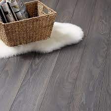 These floors can take more spillages and often be fitted as kitchen flooring or for bathroom laminate floors.they all work in different ways but commonly, the joints have a special coating or the. Goodhome Horsham Grey Oak Effect Laminate Flooring 2 06m Pack Diy At B Q
