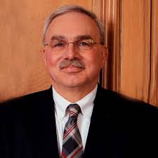 Former Commissioners