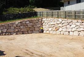 Retaining walls made from rocks and boulders are perfect for the brisbane climate. B Grade Sandstone Retaining Wall Brisbane Precision Boulder Walls Brisbane