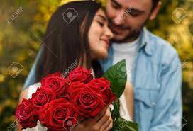 Check spelling or type a new query. Romantic Date Loving Boyfriend Giving Girlfriend Red Roses Flowers Hugging And Congratulating Her Celebrating Valentines Day In Cafe Selective Focus Stock Photo Picture And Royalty Free Image Image 139834496