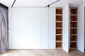 Cabinets Of Curiosities Define Rooms In Art Collector S Apartment By Mos Apartment Renovation Apartment Residential Design