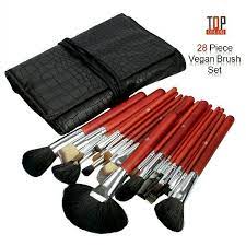 مجموعة فرش توب كلر فرش خشبيه اللون تاتي معها حقيبه جلديه انيقه تحتوي المجموعه على 28 فرشة اساسيه لأي مكياج سبع فرش للوجه winter glove flatware tray