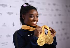Simone biles has made a name for herself in the us and the world for being the most decorated american artistic gymnast. Simone Biles Returns To Competition For First Time In 19 Months This Weekend