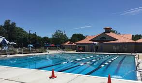 A olympic swimming pool has 13,448 square feet of surface area. Main Pool 4 12 Feet Deep Showing 3 Lap Lanes And Main Building Picture Of Western County Outdoor Pool Poolesville Tripadvisor
