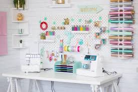 The crafty pictures appear to jump out off the wall in this simple, ethereal sewing room. Cute Functional Craft And Sewing Room Ideas Sweet Red Poppy