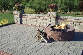 Install a permanent fire pit in your backyard with a kit. Outdoor Fire Pits How Much Does A Stone Fire Pit Cost Masseo Landscape Inc