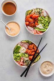 Salmon Poke Bowls With Orange Sesame Sauce Recipe Salmon Poke Salmon Poke Bowl Recipe Poke Bowl