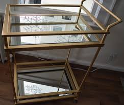 Boxed weight, approximately 75 lbs. Gold Mirrored Target Bar Cart Hack