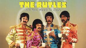 A Day In The Life - March 22nd March 22nd 1978 - All You Need Is Cash  https://www.youtube.com/watch?v=sEwySvgfwLE The Rutles "All You Need Is Cash,"  an affectionate spoof of The Beatles' career,