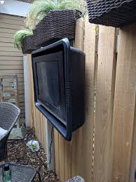 Doors for this cabinet are made from treated fence boards to mimic the pattern of the fence behind it. Outdoor Tv Enclosure 17 Steps With Pictures Instructables