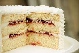 What better way to end an ina garten dinner party than with a chocolate cake? Strawberry Chic Lemon Cake With Raspberry Filling Lemon Cake Recipe Cake Desserts Cake Fillings