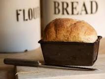 How do you keep bread from sticking to a loaf tin?