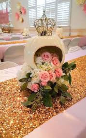 A beige ceramic cachepot helps finish. Floral Design Pink Roses With Crown Centerpiece Marcys Mess Crown Centerpiece Quinceanera Centerpieces Sweet 16 Centerpieces