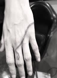 Cara had her first finger tattoo of a lion face. Cara Delevingne S 26 Tattoos Their Meanings Body Art Guru